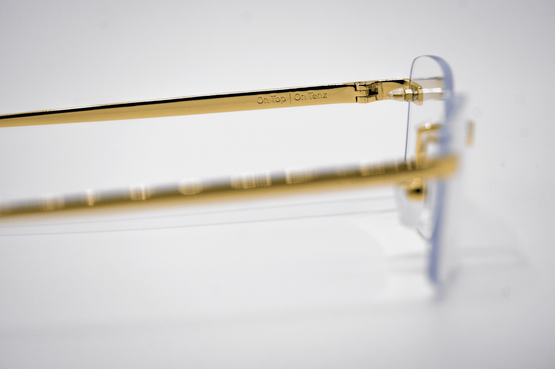 Gold Carré Transparent Zonnebril